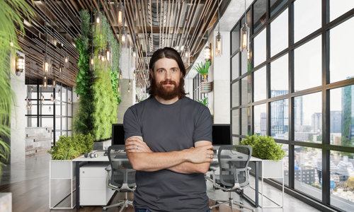 Atlassion Mike Cannon Brookes Standing In Office