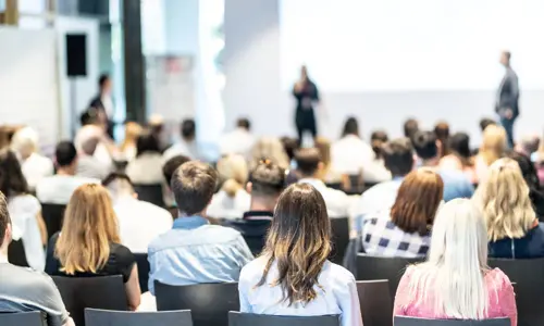 Conference crowd from back of the room