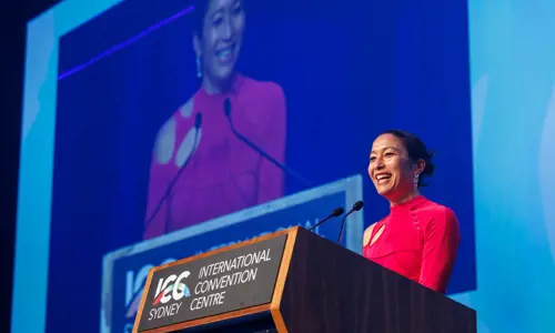 happy speaker on stage