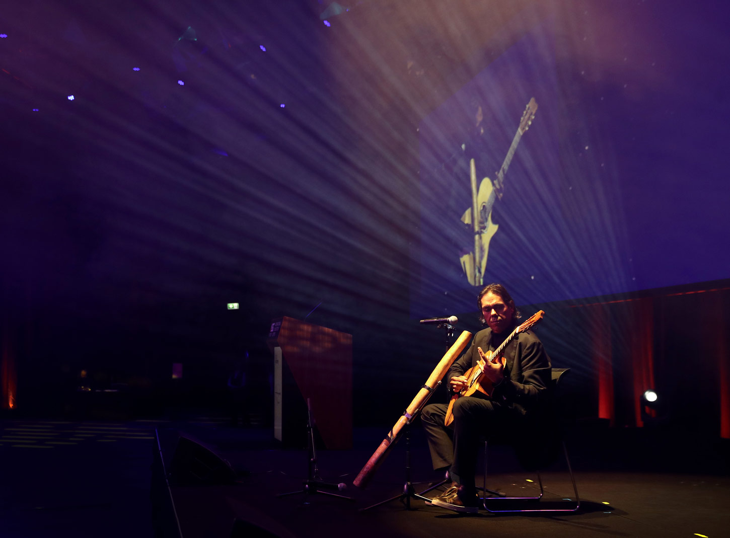 Besydney Ambo Dinner 2024 performance on stage guitar