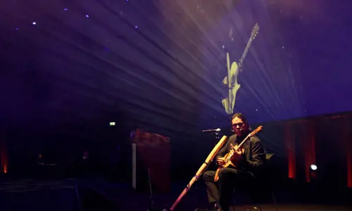 Besydney Ambo Dinner 2024 performance on stage guitar