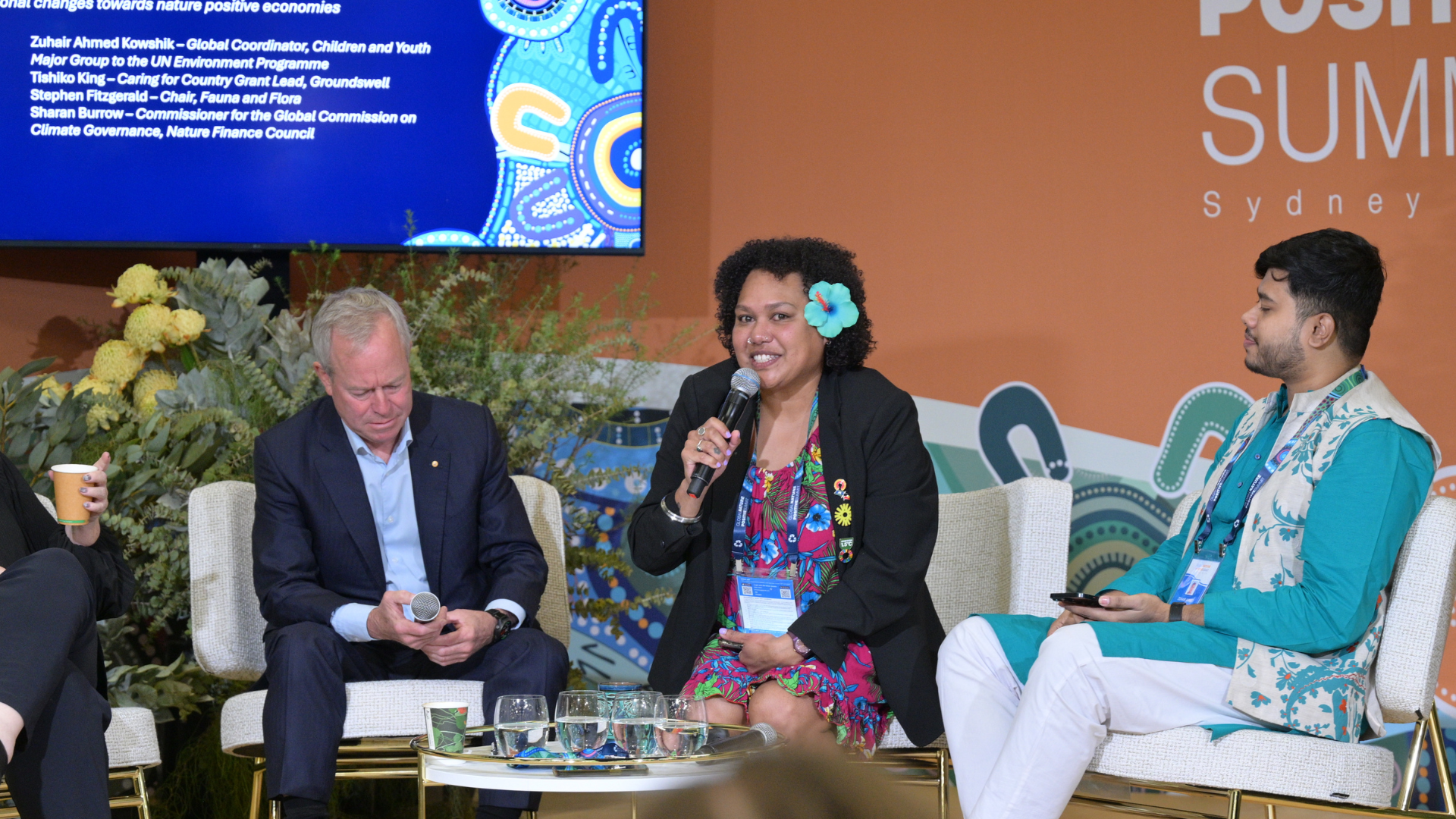 Three Speakers In An Informal Discussion Setting