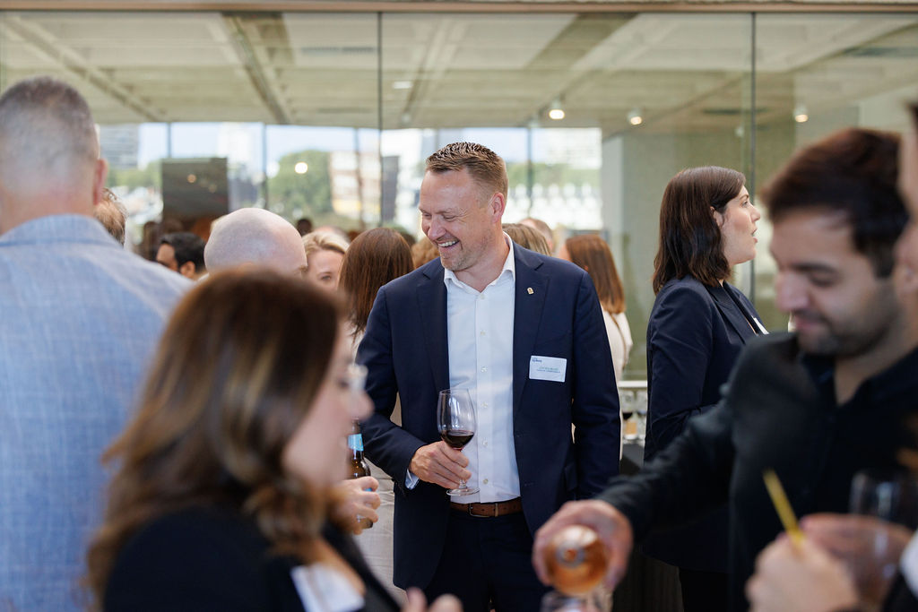 Networking event people speaking 