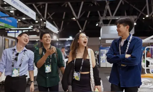 social impact campaign Students At Conference laughing