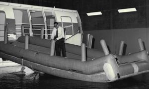 Air safety pioneer John Grant tests his inflatable escape slide in Sydney in 1965