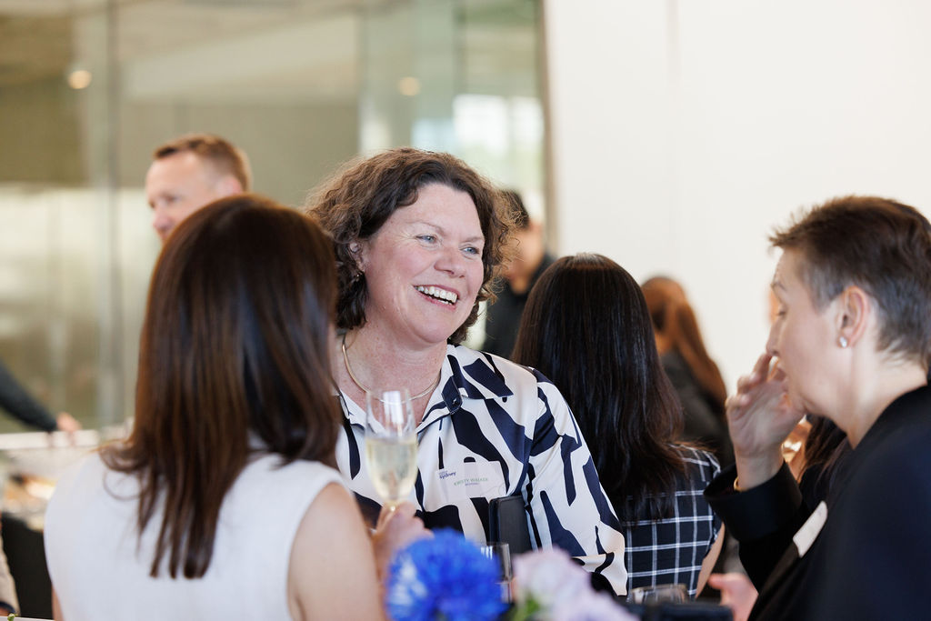 Networking event women speaking 