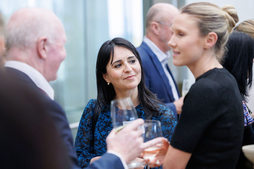 Networking event people speaking 