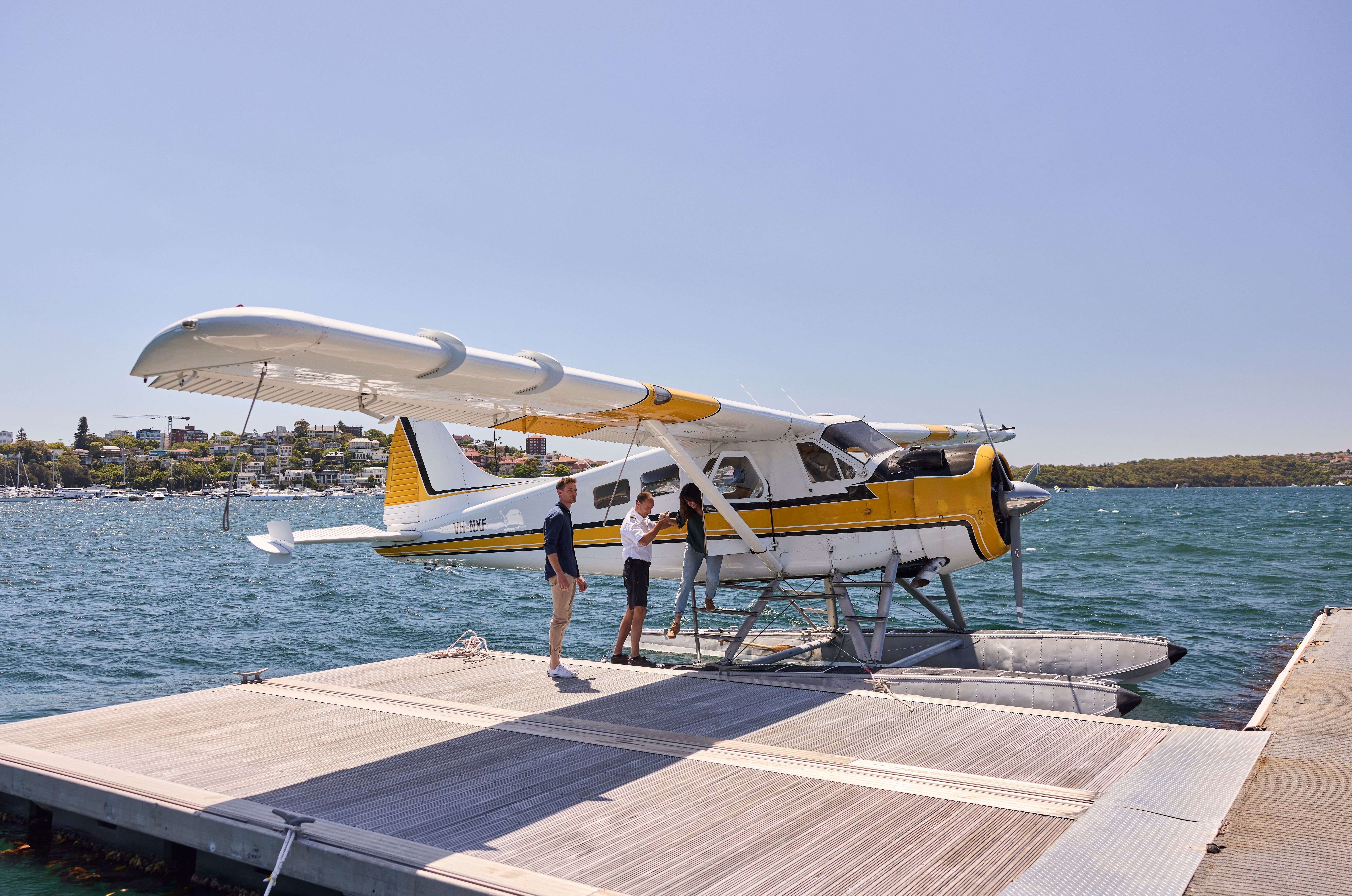 Couple getting off Sydney Seaplanes at Rose Bay
