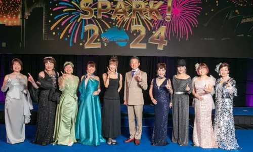 group of people on stage at the Diana Japan Incentive 2024